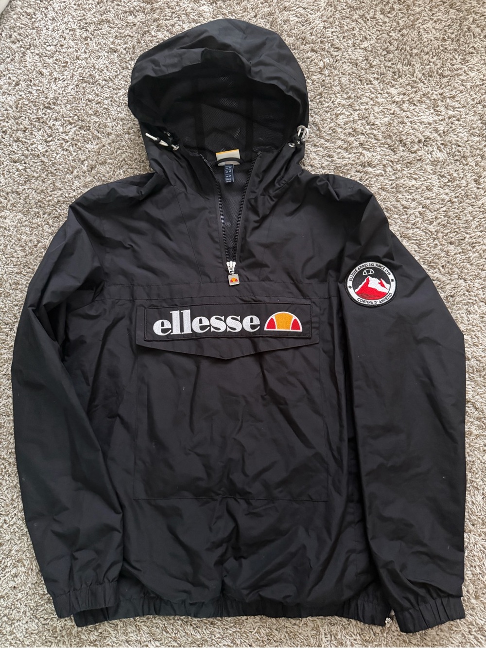 Ellesse Black Jacket with Red, Yellow & White Logo Stripe
